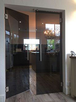 frameless glass double doors with grey tinted glass