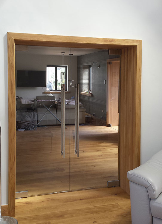frameless glass double doors with pivot hinges