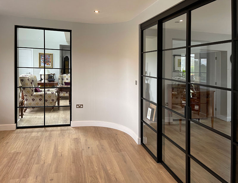 grafic crittal style sliding doors and fixed panel