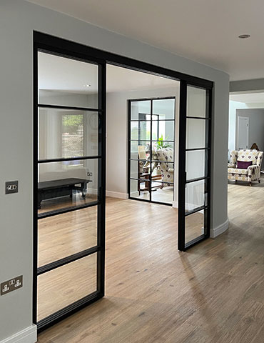 img 5 Piazza Grafic Industrial style sliding doors and panels with visible track