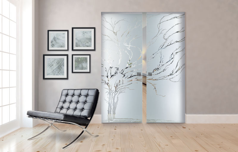 frameless glass pocket door with sandblasted design